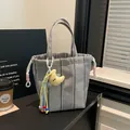 Minimalist black and white checkered commuter tote bag with a moon plush pendant - One Size / Black