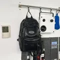 Minimalist black faux leather school backpack for students and casual travel use - One Size / Black
