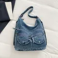 Vintage blue denim backpack with multi-pocket design for student and commuting use - One Size / Vintage Blue