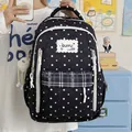Zaino studentesco nero alla moda con motivi a stelle bianche e tasca frontale a contrasto - senza ciondolo / Nero