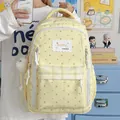 Zaino scolastico giallo con motivi a stelle e un ciondolo di peluche bianco morbido - senza ciondolo / Giallo