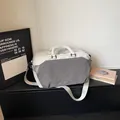 Minimalist white and gray color-blocked travel duffel bag for weekend short trips - Gray