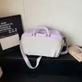 Lavender and light grey lightweight travel handbag with adjustable shoulder strap and handles - Light Purple