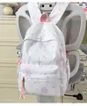Großer weißer Schulrucksack für Mädchen mit grauen Sternmustern und rosa Quasten - Mit Anhänger / Rosa