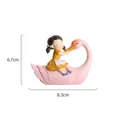 Cute girl sitting on a pink swan resin figurine ornament with dimensions - Pink Swan Yellow Dress Girl