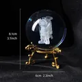 Creative crystal ball with laser engraved astronaut on an elegant gold metal stand - Astronaut (Gold)