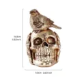 Detailed view of Halloween golden resin skull sculpture with perched bird statue decoration - Crow On Skull Style (Gold Foil)