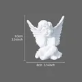 Detailed view of white resin angel ornament showing 8.5cm height and 8cm width - X Angel Resting Face