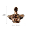 Portaocchiali a teschio in resina bronzo antico per scrivania, larghezza 12,4 cm - Portaocchiali Teschio / Oro antico