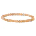 A detailed view of a 4mm natural orange stone beaded bracelet with glossy finish - 4mm / Sunstone