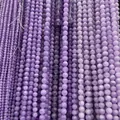 Close-up detail of natural lavender amethyst beads with icy translucent texture - 4mm (Approx 90 Pcs) Strand / Natural Lavender Jade (Purple Waxed)