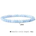 Close-up of 4mm light blue natural stone bracelet with a 19cm circle length. - 4mm / Aquamarine