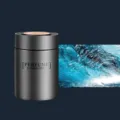 Sleek metallic grey cylindrical car solid perfume balm canister with Cologne scent - Charm Cologne
