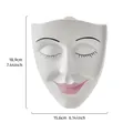 Decorative wall-mounted white resin face planter pot showing dimensions 18.9cm by 15.6cm - Mask face vase-white
