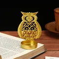Bougeoir hibou doré vintage en fer pour décoration intérieure sur fond de livre - Forme de Hibou / Or