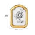 Elegant vintage gold curved resin photo frame featuring a classic floral sketch design - 7" / Gold