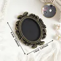 Vintage European style mini black and gold magnetic photo frame for DIY wall decor, 9.3x7.8cm - Oval Relief Style (A87)