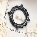 European vintage style embossed floral resin photo frame in black and silver finish - 11.2cm