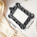 Vintage black and silver resin picture frame with ornate relief carvings - 11.6x8.7cm