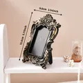 Vintage black and gold relief picture frame with 9x13cm dimensions shown on shelf - A56 Rectangular Style (Prop Photo Frame - Black Gold) / 9x13cm