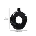 Black minimalist donut-shaped resin decorative vase with a circular hollow design - S / Black