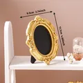 Ornate vintage gold oval relief photo frame for elegant desktop home decoration - 9.5x11.7cm