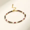 Elegante pulsera de cuentas de cristal multicolor hecha a mano con detalles dorados - Cuarzo ahumado