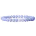 Macro view of 6mm blue frosted cracked natural stone beads on a flexible elastic bracelet - Blue Weathered Stone