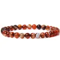Close-up of 6mm polished natural stone beads with unique banding patterns on a stretch bracelet - Orange Red Banded Agate