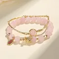 Elegant rose quartz beaded bracelet featuring gold snake charm and good luck tag - Rose Quartz Bracelet (SL5587)