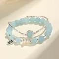 Elegant aquamarine and freshwater pearl beaded bracelet with silver snake charm. - Aquamarine Bracelet (SL5587)