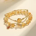 Elegant yellow citrine beaded bracelet with golden snake charm and freshwater pearl accent - Citrine Bracelet (SL5587)