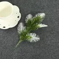 Close-up of artificial pine sprig with frosted white tips, perfect for Christmas DIY decor - Five-Head Snow Pine Branch / Dark Green (With Snow)