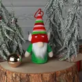 Green Christmas elf gnome plush doll pendant with striped hat on natural wooden stump - Elf Ear Doll (Male Style)