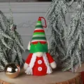 Adorable handmade Christmas elf gnome plush ornament featuring a festive red striped hat - Elf Ear Doll (Female Style)