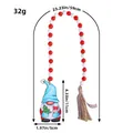 Decorative Christmas gnome wood bead garland featuring red and white beads with jute tassel - Blue Hat Gnome (With Snowflake)