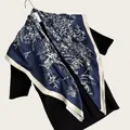 Detail shot of navy blue silk scarf with white ink-painted bird and flower patterns - Artistic Ink Painting Square Scarf / Navy Blue / 90cm