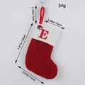 Calcetín navideño de punto rojo con letra E bordada y etiquetas de medidas precisas - Letra E