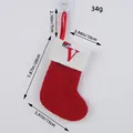 Calcetín de Navidad rojo de punto con borde blanco y letra V roja - Letra V