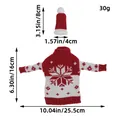 Gestrickte Weihnachts-Weinflaschenhüllen-Set mit rotem Schneeflocken-Pullover und Hut - Schneeflocke