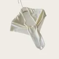 Elegant lightweight cream knitted triangle shawl detail showing soft fabric texture. - 145cm / Pearl White
