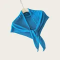 Detailed view of the bright blue thin knit triangle shawl for women's shoulder drape. - 145cm / Sea Salt Blue