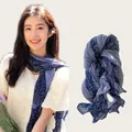 Close-up of lightweight floral pleated cotton linen scarf with soft artistic pattern - 180cm Long / Retro Blue Floral
