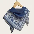 Close-up of elegant blue floral square scarf featuring breathable lightweight fabric - 70cm / Sea Blue