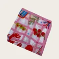 Detailed view of the pink checkered scarf with colorful lobster and vegetable prints. - 58cm / Pink Lobster Print