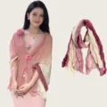 Detail view of a pink pleated cotton-linen scarf worn as a shawl by a model - 180cm / Pink Gradient Scarf