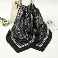Detailed look at elegant black and white paisley pattern on satin silk square scarf - 90x90cm / Black (AR-7)