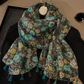 Close-up of elegant floral print scarf featuring delicate fringe tassel details and texture - 180cm / Begonia