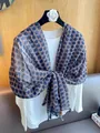 Blue and brown polka dot scarf with fringe tassels shown on a white hanger - 180cm / Blue Retro Polka Dot