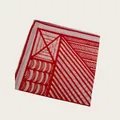 Close-up of a folded silk scarf featuring bold red geometric patterns on white fabric. - 58cm / Red Geometric Print (58CM-25#)